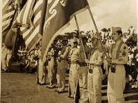 31 July 1947, Ft. Shafter, Oahu, T.H. Color bearers of the 442nd Infantry Regiment and the 100th Infantry Battalion stands at attention as troops pass in review during cermonies reactivating the famed fighting unit into the regular Army Reserve Corps held at Fort Shafter.