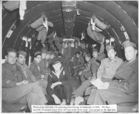 Moriso Teraoka (second in from right) and other GIs returning from Europe on a DC-3 transport plane [Courtesy of Moriso Teraoka]
