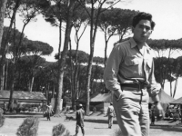 Paul Nishimuta walks though camp in Tombolo, Italy, 1946. [Courtesy of Bernard Akamine]