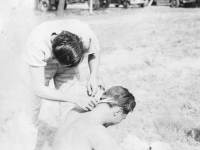 G.I. haircut. Ono cutting Rokue. [Courtesy of Bert Hamakado]