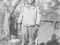 Tadayoshi Hamasaki stands in front of his tent. [Courtesy of Mary Hamasaki]