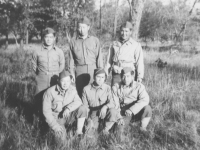 100th Battalion soldiers pose for a photograph in the forest. [Courtesy of Mary Hamasaki]