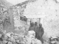 Soldiers gather in the rubble of an Italian city, 1944. [Courtesy of Mary Hamasaki]