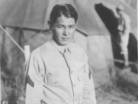 Tadayoshi Hamasaki poses in front of a tent in camp. [Courtesy of Mary Hamasaki]