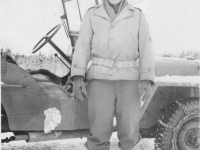 Tadayoshi Hamasaki in front of his jeep in Wisconsin, November 27, 1942. [Courtesy of Mary Hamasaki]