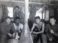 Martin Iida, Higa, "Kat" Funamura, Noboru ? 1943 In hut --- Camp Shelby, Miss.  (Courtesy of Dorothy Inouye)