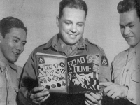 Two veterans of the Italian Campaign, PFC James Takae (left) and PFC. Shoichi Tengen (right) informs LT. Col. John Weaver of all the tough battles endured by the 100th INF. BN.  [U.S. Army Signal Corps]