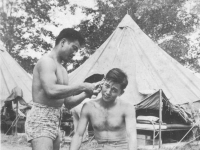 George T. Inouye getting a haircut. [Courtesy of Colleen Iwata]