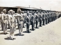 (1942) 100th Infantry Battalion. Eugene Kawakami is in the front row, third from the left.   [Courtesy of joanne Kai]