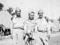 (July 20, 1942) Cpl. Walter Moriguchi, Pfc. Tanoue, Cpl. Yozo Yamamoto, & Sgt. Kawakami.  Eugene Kawakami is crouched in the front.  [Courtesy of Joanne Kai]