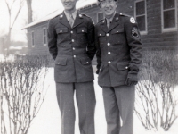 (December 25, 1942) “Sgt. Yoshiura and S/Sgt. Kawakami at Camp Savage, Minnesota”. Eugene Kawakami (right), Kenneth Yoshiura (left), and a few others went to visit their friends who transferred from Company “A” to the MIS. They enjoyed a nice Christmas dinner with them at their training site, Camp Savage.   [Courtesy of Joanne Kai]
