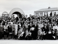 (October 1962) Members of the 100th Infantry Battalion Veteran’s Club, “Club 100”, at the Hiroshima Peace Memorial. This was the first time the club organized a trip to Japan. Eugene Kawakami is in the middle-right of the front row, wearing a black suit with leis.  [Courtesy of Joanne Kai]