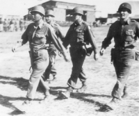 Major Fukuda passing in review at a parade in Novi Ligure, Italy for Generals Truscott and Almond on May 13, 1945 [Courtesy of David Fukuda]