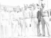 Taken while coming back to camp after our 3 day furlough to Minneapolis. Stopped over at Winona. Left to right - Corp. Samuel Tomai, Corp. Mushy Miyagi, Sgt. Tokuda Kozumi, P.F.C. Joseph Takata, Corp. Hideo Yamashita, Sgt. Goro Moriguchi. [Courtesy of Leslie Taniyama]