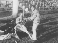 Richland Reuter Aug 11, 1942, Manager Edward Mitsukado catching mascot Raymond Nosaka batting. [Courtesy of Leslie Taniyama]