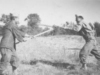 Pvt. Tsuyoshi Furukawa and myself in Bayonet training. He is one of my squad members. [Courtesy of Leslie Taniyama]