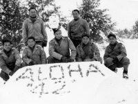 Taken on Dec. , 1942. On our drill field. Kneeling L to R. Corp. Jinohara, Sgt. Miyagi, Lt. Keys, Sgt. Yamamoto, Corp. Higashi, Standing: S/Sgt. Yamada, Sgt. Omokaw. [Courtesy of Leslie Taniyama]