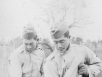 Poor Suckers.  Oct. 24, 1942 at Old Camp McCoy at old abandoned farm house.  At work digging out grass at New Camp McCoy.  [Courtesy of Jan Nadamoto]