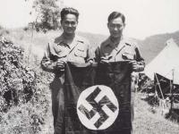 Anzai and Sakurada with Nazi Flag. [Courtesy of Fumie Hamamura]