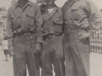 Rot Izumi and Stanley Hamamura pose with a French soldier in Rome. [Courtesy of Fumie Hamamura]