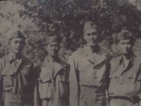 Stanley Hamamura, Fred Hosokawa, Seiji Kimura, and H. Hiyane in bivouac area in Italy. [Courtesy of Fumie Hamamura]