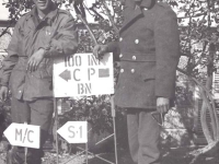 Kungo Iwai and Eo Ikum standing at the 100th Bn. Camp sign in Leghorn, Italy. [Courtesy of Fumie Hamamura]