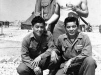 Soldiers gather around for a picture in Ghedi, Italy, June 1945 [Courtesy of Carol Inafuku]