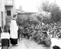 Chaplain Israel Yost conducts church services, Orciano, Italy (July 15, 1944) [Photograph by U.S. Army Signal Corps]