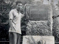 Kaoru at the 442nd RCT monument in Bruyères in 1958. [Photo courtesy of Stanford Miyamoto]