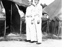 Yasuo Takata, James Kawashime in front of tents at Camp McCoy, Wisconsin [Courtesy of Alexandra Nakamura] Inscription: Tent Mate, Sgt. Takata