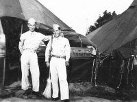 Yukio Yokota & Yasuo Takata in front of tents in camp. [Courtesy of Alexandra Nakamura]