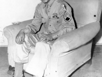 James Kawashima sitting on a chair in the family home after the war [Courtesy of Alexandra Nakamura]