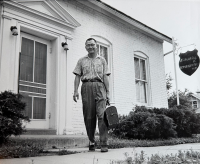 Dr. Kiyoshi Furumoto outside of his office in Keosauqua, Iowa. [Photo courtesy of Emily Furumoto]