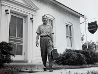 Dr. Kiyoshi Furumoto outside of his office in Keosauqua, Iowa. [Photo courtesy of Emily Furumoto]