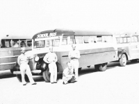 Standing in Front of school bus in La Crosse, Wisconsin. [Courtesy of Sonsei Nakamura]