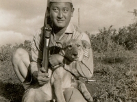 Sgt. Shimogaki with dog. (Courtesy of Alvin Shimogaki)