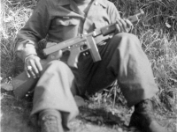 William Takaezu with gun. [Courtesy of Mrs. William Takaezu]