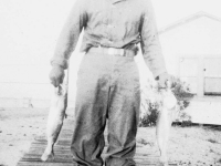 William Takaezu with trout on Cat Island, Mississippi. [Courtesy of Mrs. William Takaezu]