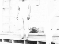 William Takaezu in front of cabin on Ship Island, Mississippi. [Courtesy of Mrs. William Takaezu]