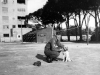 Our pet mascot and myself (Takashi Manago) in Leghorn, Italy (January 25, 1946). [Courtesy of Dr. Takashi Manago]