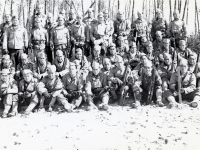 3rd Platoon, Co. E, 100th Inf. Bn., at Camp McCoy, Wisconsin. Thomas Taro Higa seated in front row; far right. (1942) [Courtesy of: Thomas Taro Higa Family Collection]