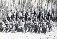 3rd Platoon, Co. E, 100th Inf. Bn., at Camp McCoy, Wisconsin. Thomas Taro Higa seated in front row; far right. (1942) [Courtesy of: Thomas Taro Higa Family Collection]