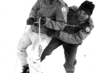 Gary Uchida and Tom Fujise go sledding at Camp McCoy, Wisconsin, winter 1942. [Courtesy of Janice Uchida Sakoda]