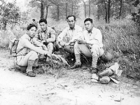 Masao Koizumi, Masji Kutara, Richard Yoneshige, and Uki Wozumi take a rest [Courtesy of Ukichi Wozumi]