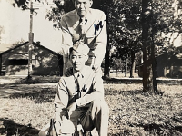 Yasuyuki Kurokawa (standing) [Courtesy of Julie Kurokawa]