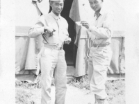 Sam Tomai and Takashi Kitaoka in front of their tent at Camp McCoy [Courtesy of Sandy Tomai Erlandson]