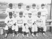 Outfielder members of the Aloha team. Standing (l-r) Honbo, Shiyama, Miyagi, Nozaki, Fukuda.  Siting (l-r) Takeba, Kaneko, Yamashita, Takata [Courtesy of Sandy Tomai Erlandson]