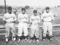 Infielder members of the Aloha team.  Yamamoto on 3rd Base, Tomai as short stop, Miyagi on 2nd base, and Yamada on 1st. [Courtesy of Sandy Tomai Erlandson]