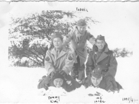 (Clockwise from left) Kumi, Tommy, Tabata, Sam Tomai, and Hide play in the snow at Camp McCoy, Wisconsin, November 1942 [Courtesy of Sandy Tomai Erlandson]