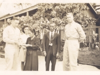 Soldiers present the Nakamine family with Shinyei's medal. (Courtesy of Anita Korenaga)